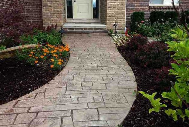 Cobblestone stamped concrete walkway
