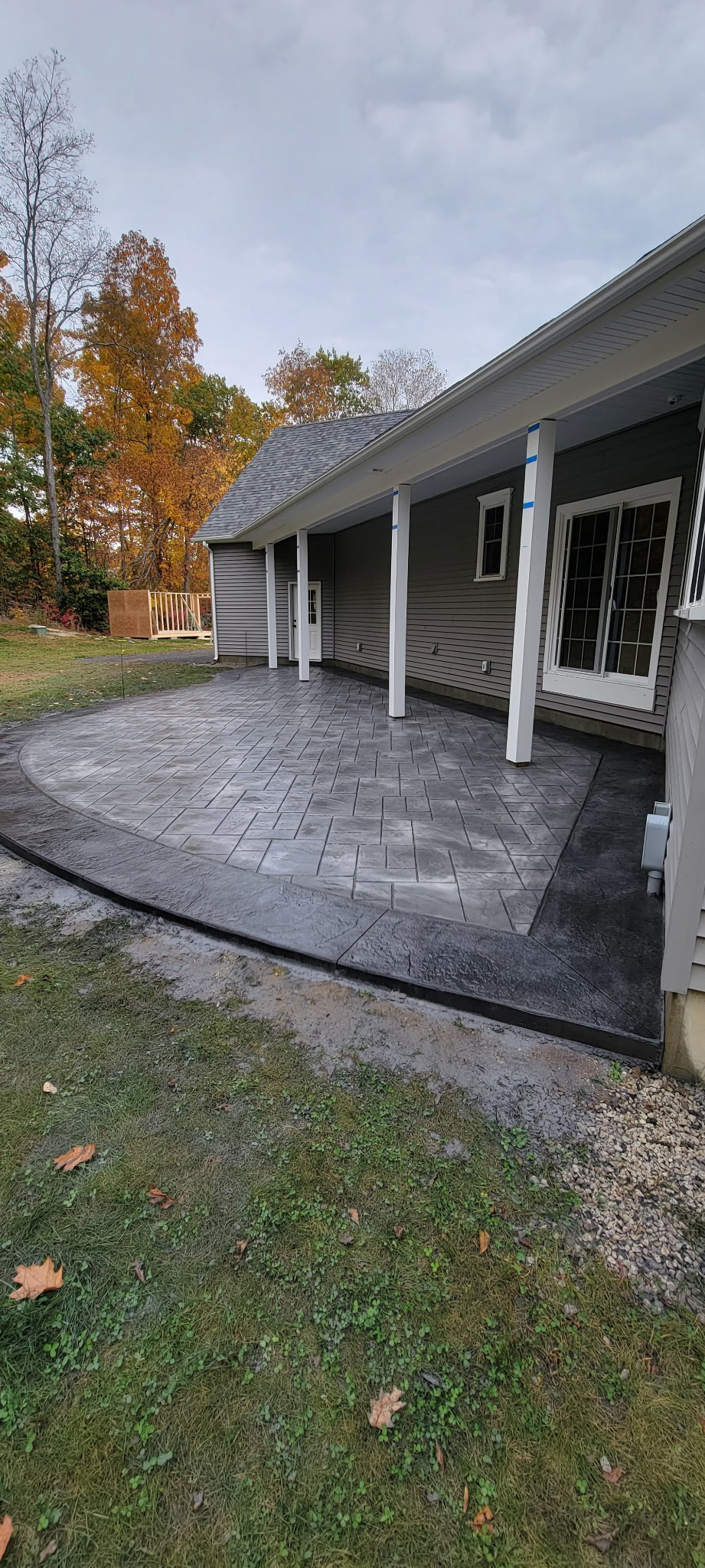 Stamped decorative concrete patio by Patriot Concrete