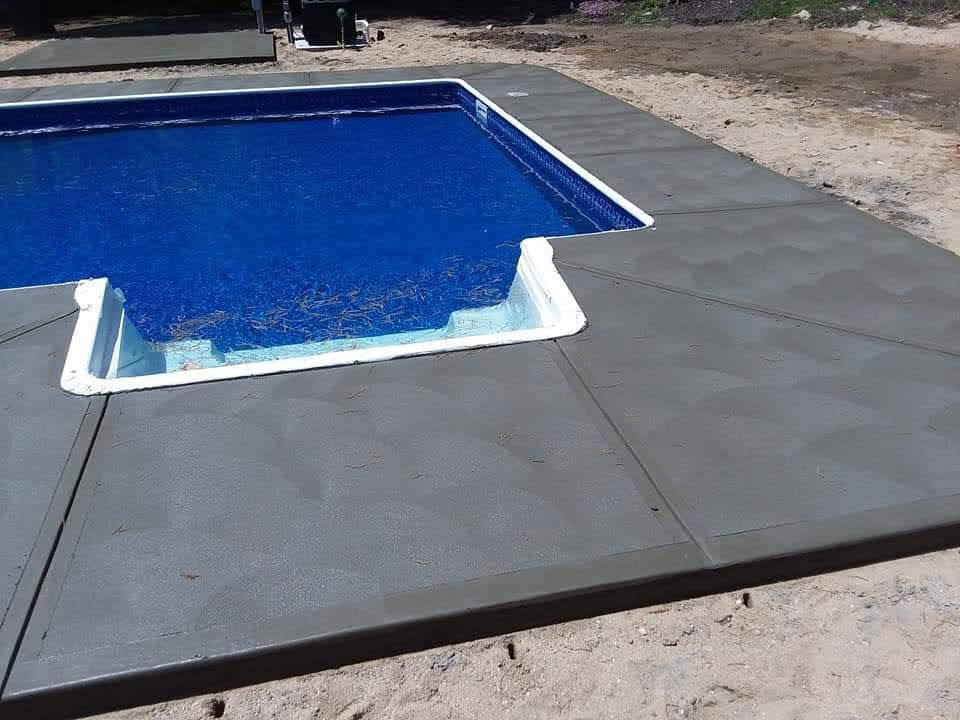 Pool patio with textured concrete finish — Rochester, NH